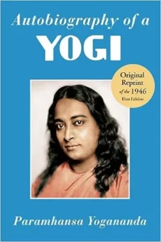 Autobiography of a Yogi Book cover of *Autobiography of a Yogi by Paramahansa Yogananda* shows his portrait with long hair and orange robe on a blue background; a gold sticker marks it as the Original Reprint of the 1946 First Edition.