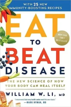 The cover of Eat to Beat Disease by William W Li, MD shows colorful fruits and vegetables around the title and includes a sticker noting it as a New York Times bestseller.