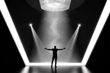 A person stands with arms outstretched in a dark room, illuminated by dramatic beams of white light and mist from above, framed by bright diagonal lines forming a large V shape, evoking focus and clarity like the Ivy Lee Method.