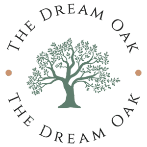 A green oak tree illustration is centered with the words “The Dream Oak” curved above and below it in black text. Two small brown dots are on either side of the tree. The background is light gray.